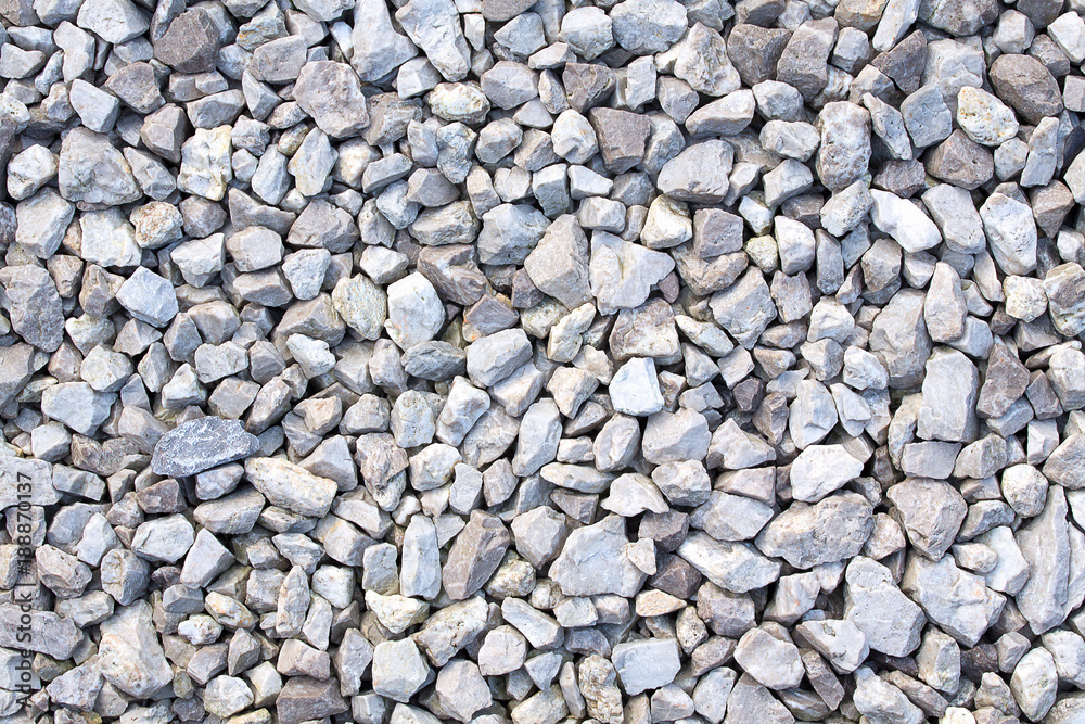 Gravel texture. Small stones, little rocks, pebbles in many shades of grey,  white and blue. Texture of little rocks Stock Photo