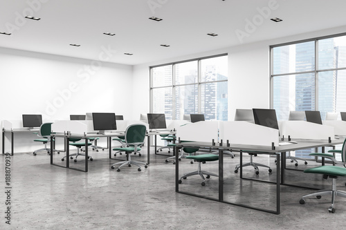 Open space office with green chairs