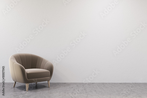 Empty white room, beige armchair