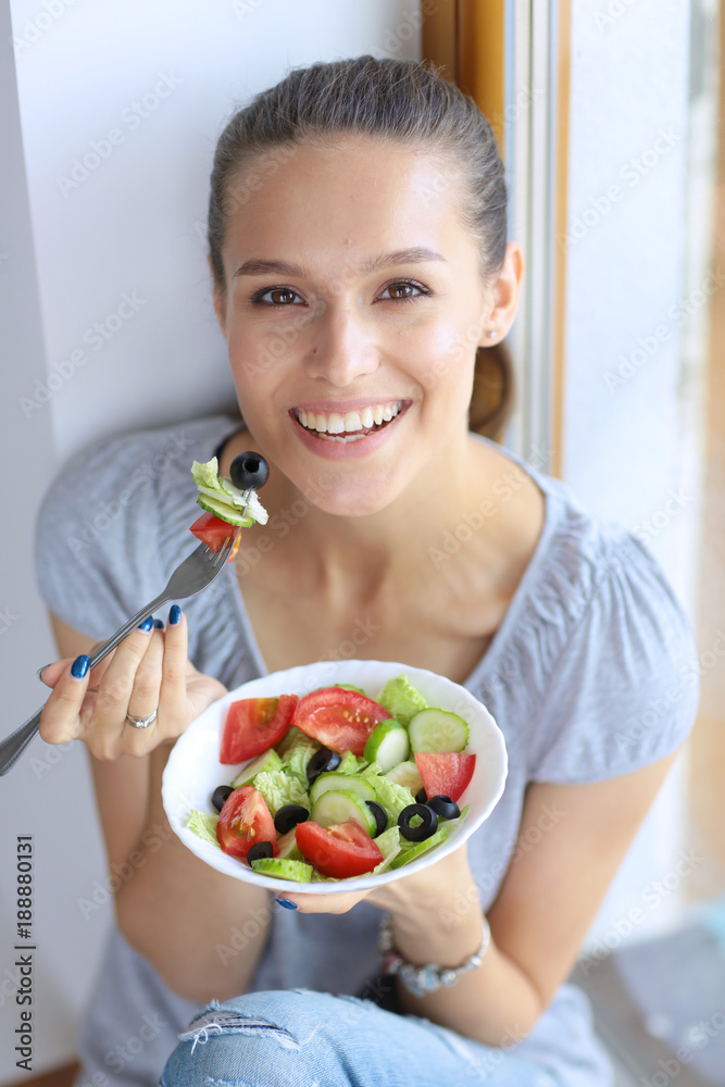 A beautiful girl eating healthy food. Beautiful girl A beautiful girl eating healthy food. Beautiful girl