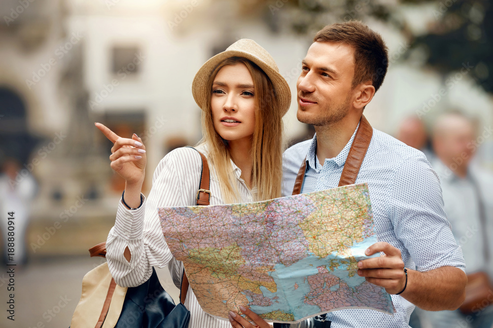 Fotografie Couple With Map On Travel Vacations, Sightseeing