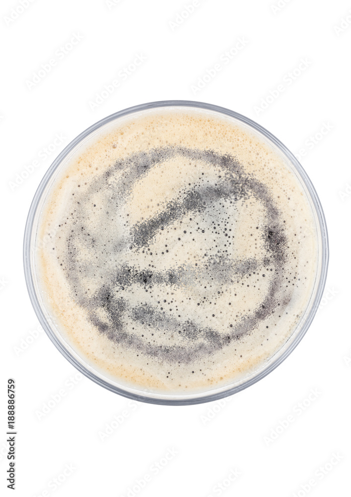 Glass of stout beer top with basketball shape Glass of stout beer top with basketball shape
