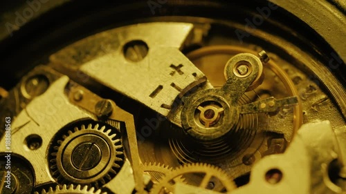 Wallpaper Mural Clock pendulums. Old vintage analog clock mechanism watch time going fast, closeup detail timelapse time running fast Torontodigital.ca