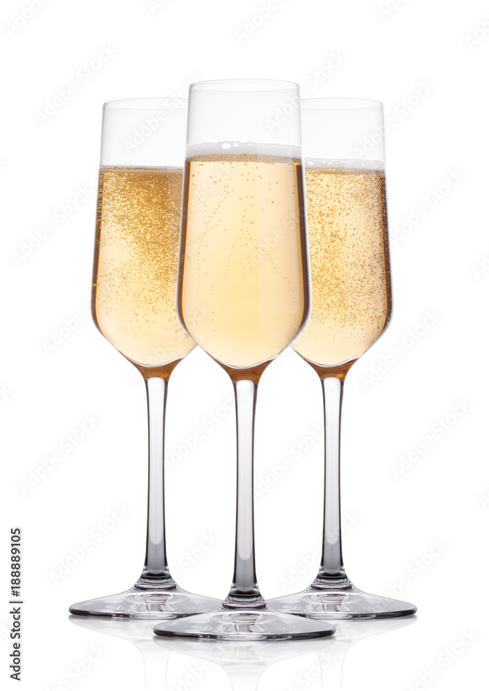 Elegant glasses of yellow champagne with bubbles Elegant glasses of yellow champagne with bubbles