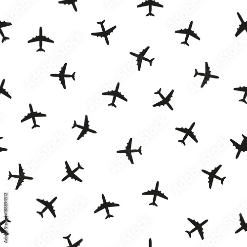 Plane seamless pattern isolated on white background. Background with airplane icons. Vector illustration.