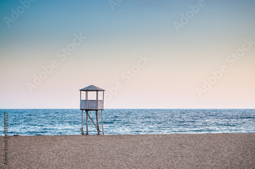 Baywatch tower, in an empty beach © C.Pavletic