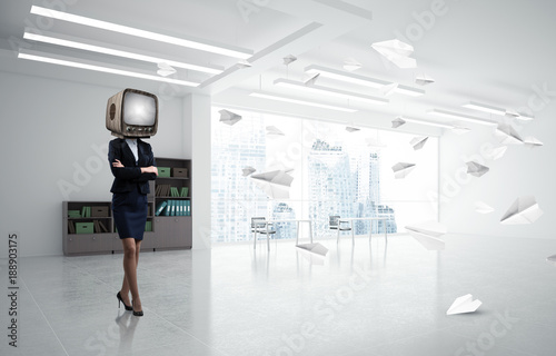 Business woman with an old TV instead of head. © adam121