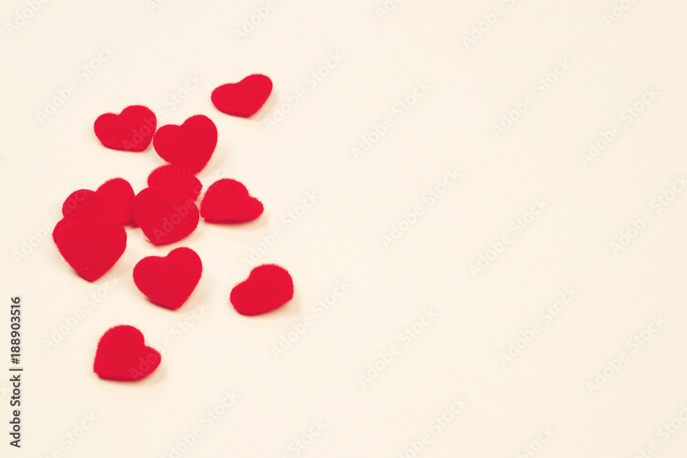 Colorful hearts on a beige background. Valentines day love