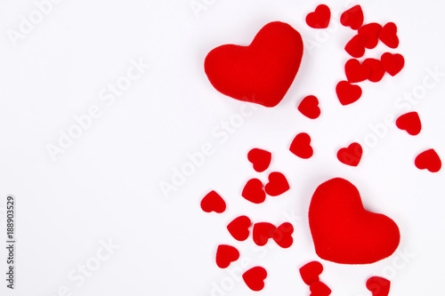 Red heart shapes on white background with copy space. Love concept for valentines day with sweet and romantic moment. Wedding background.
