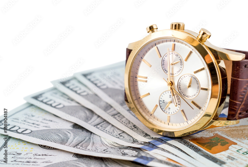 Wrist watch on the money. Isolated on white. Close up. Wrist watch on the money. Isolated on white. Close up.