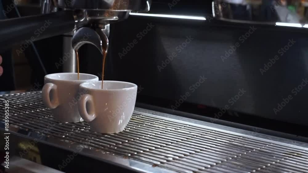 Professional coffee machine making double espresso coffee