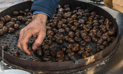 Fried chestnuts in a frying pan
