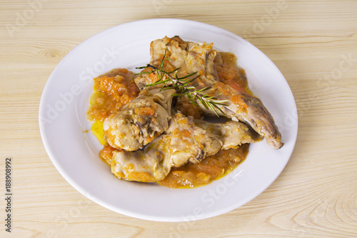 meat. dish with rabbit stew and rosemary