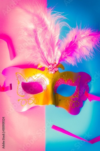 Fototapeta Naklejka Na Ścianę i Meble -  Carnival mask on two colors background