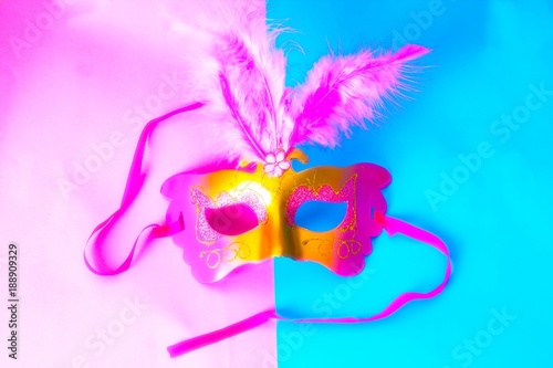 Carnival mask on two colors background