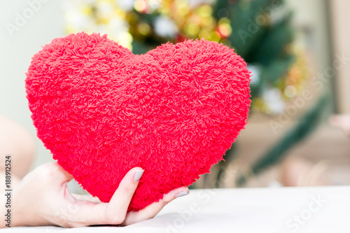 Heart pillow in women in the moring