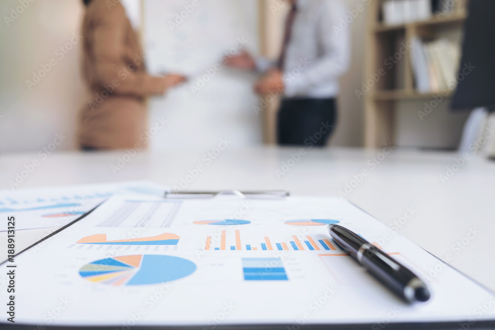 Business people conference, Two confident executive colleagues meeting and discussing, working in business strategy and financial plan to investment profit on graph and chart