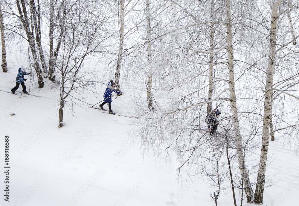 children skiing on the white snow