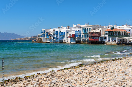 A view of Aegean Sea and colorful houses in Little Venice in Mykonos town. Mykonos island, Greece