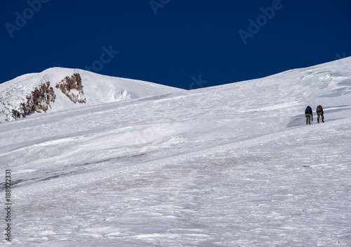 Climbing of alpinist in Caucasus mountains