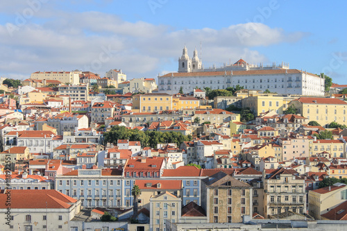 Cityscape of Lisbon, Portugal. Brightly Coloured Buildings. Monastery of Sao Vicente de Fora on Skyline