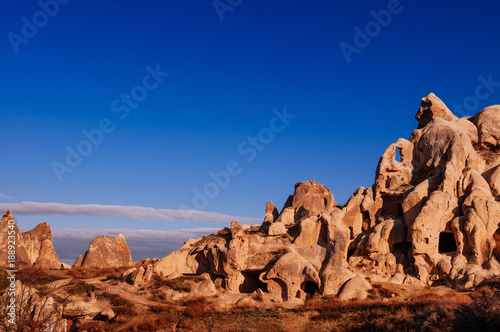 Amazing Volcanic Landscape of Goreme Cappadocia, Turkey in a beautiful winter day and clear blue sky