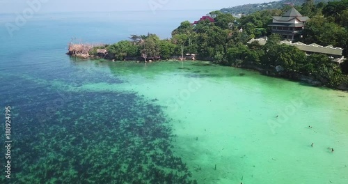 Drone flying above koh Raham area, Haad Son sand beach and Secret beach at koh Phangan island,Thailand photo