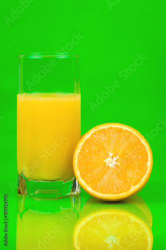 orange juice on a green background