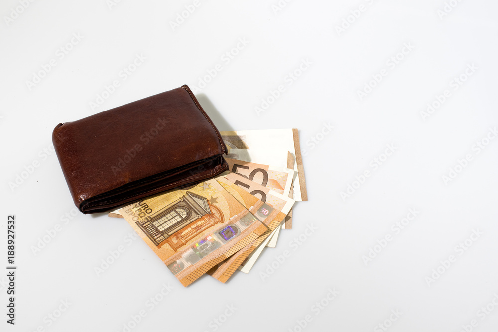 Wallet with money composition in a white background Wallet with money composition in a white background