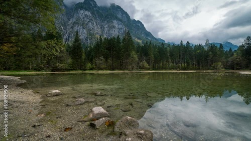 Time lapse panning across the beautiful crystal clear waters of Koppenwinkellacke in Obertraun Austria. photo