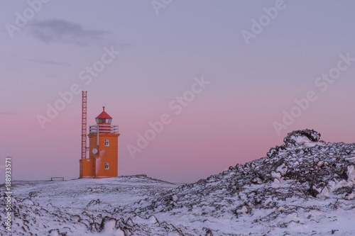 Hopsnes Lighthouse, on the Reykjanes Peninsula in Iceland at twilight photo