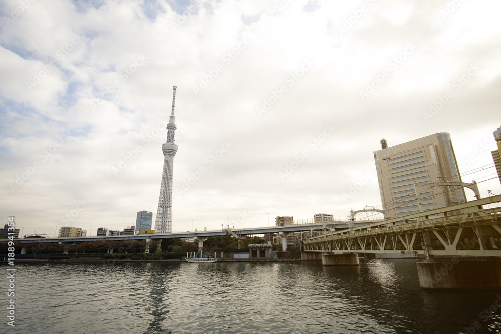 Tokyo Skytree Tower with Japan skyline on the sumida river