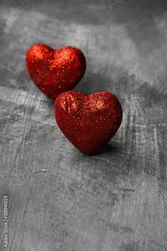 Red hearts on a dark background