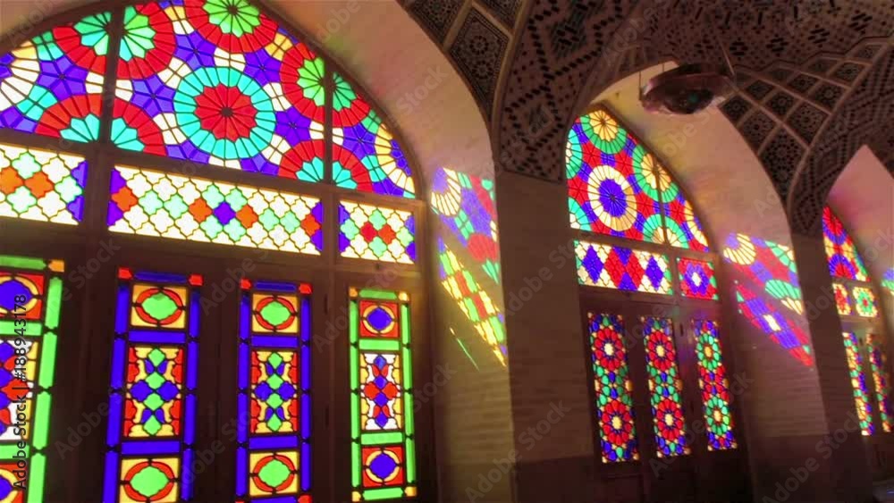 bright sunlight reflecting through the colored stained glass windows into the mosque Nasir Molk Mosque in Shriaz