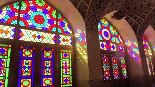 bright sunlight reflecting through the colored stained glass windows into the mosque Nasir Molk Mosque in Shriaz
