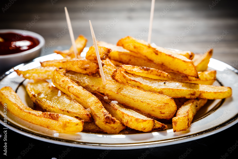 Chips on wooden background Chips on wooden background
