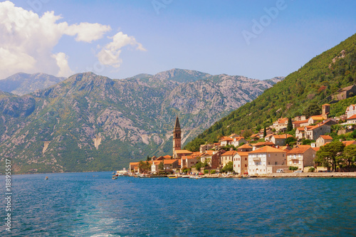 Summer trip. Montenegro, view of Bay of Kotor and ancient town of Perast with bell tower of