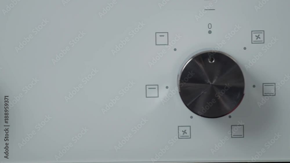 Metallic Toggle Switch of the Cooker Oven. Close-up View. Digital Clock ...