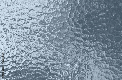 Canvas Print Texture of uneven convex gray glass