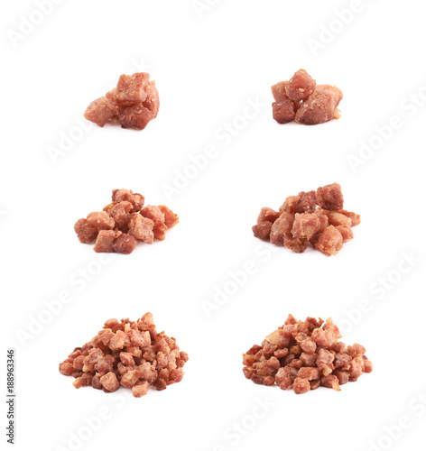 Pile of fried bacon bits isolated
