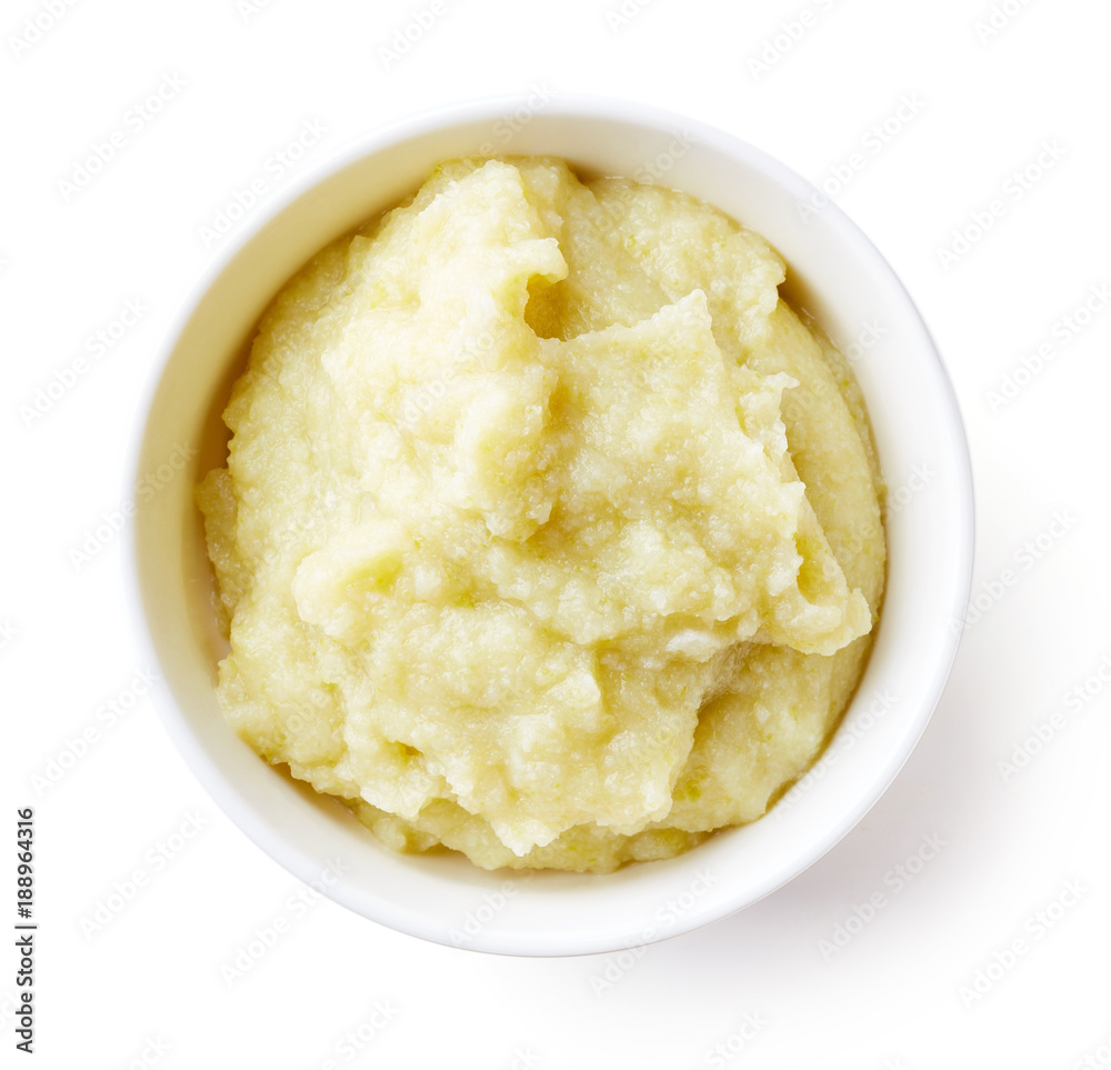 Cauliflower and zucchini baby puree isolated on white Cauliflower and zucchini baby puree isolated on white