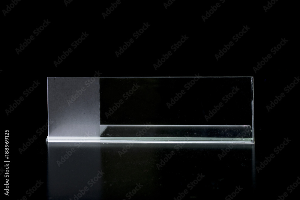 custom made wallpaper toronto digitalHorizontal standing glass microscope slide, reflecting on a black surface