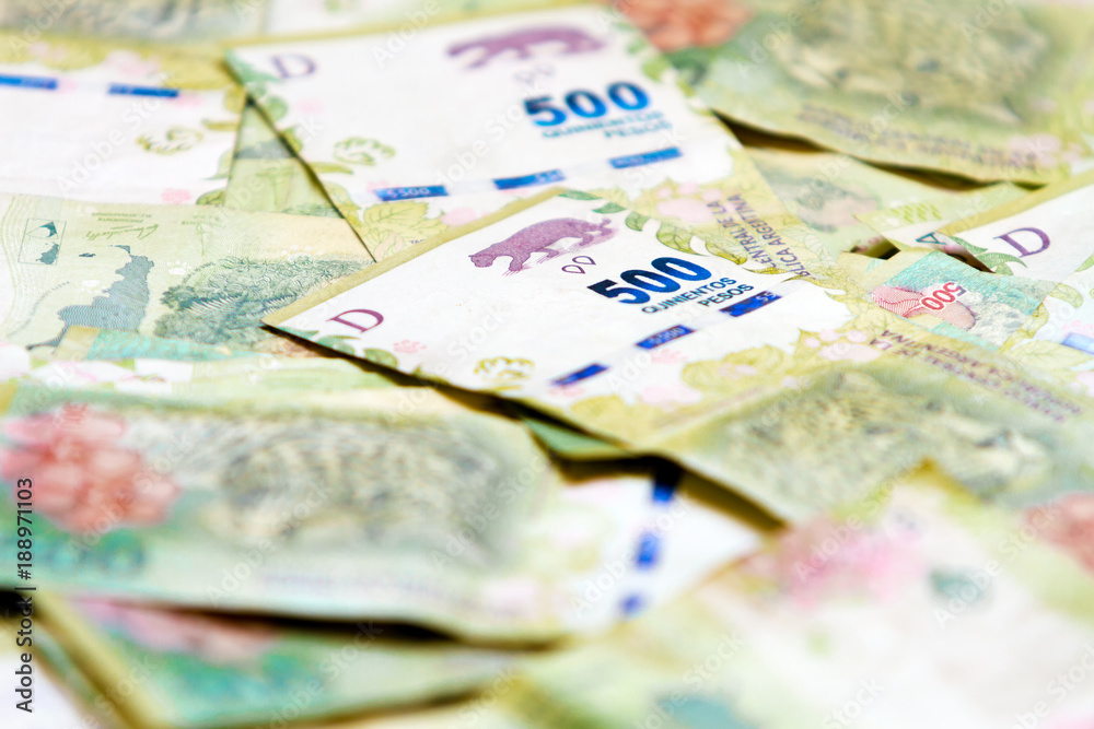 Macro close-up of 500 Argentine pesos unordered bills Macro close-up of 500 Argentine pesos unordered bills