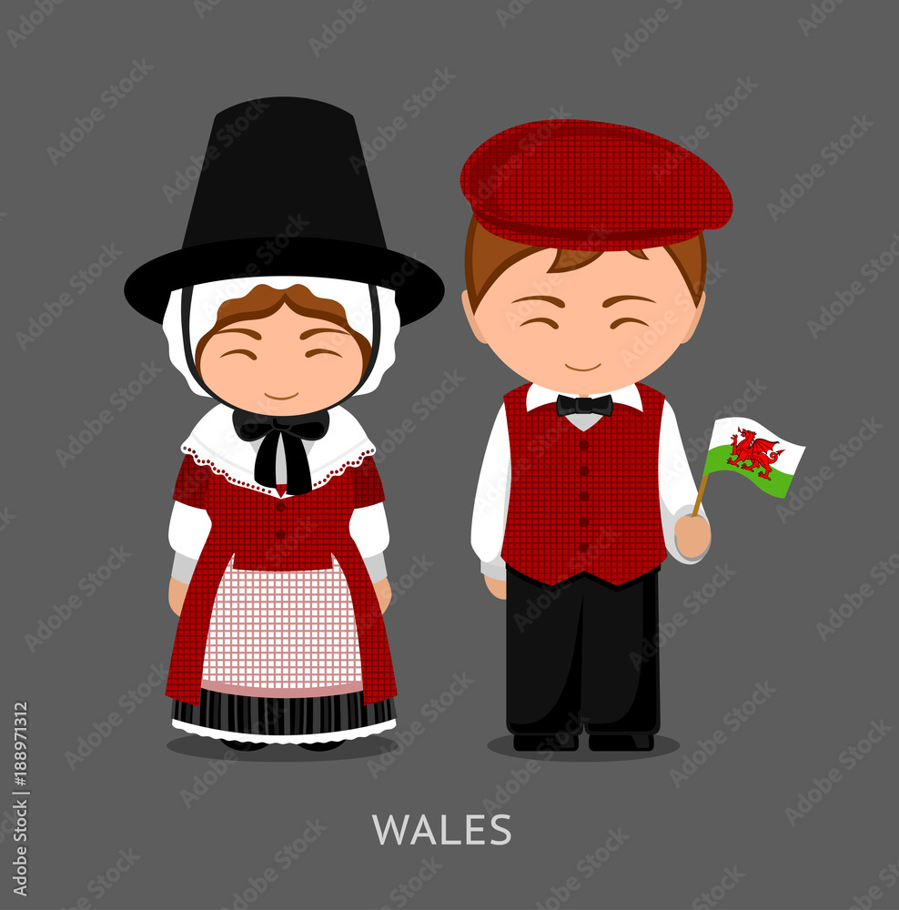 Welsh in national dress with a flag. Man and woman in traditional costume. Travel to Wales
