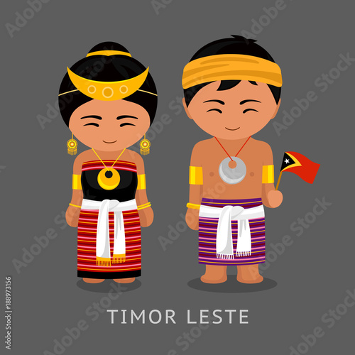 Travel to Timor Leste. People in national dress with a flag. Man and woman in traditional costume. Vector flat illustration.