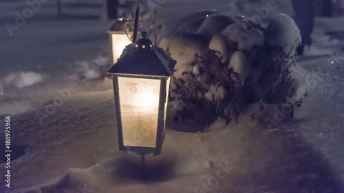 Photography Gravlyckta lyser upp vintermörkret på en kyrkogård i Stockhol