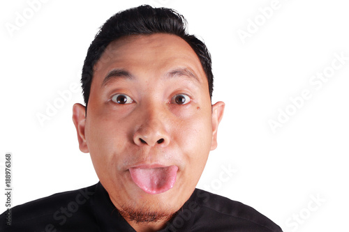 Asian Man Mocking with Tongue Out