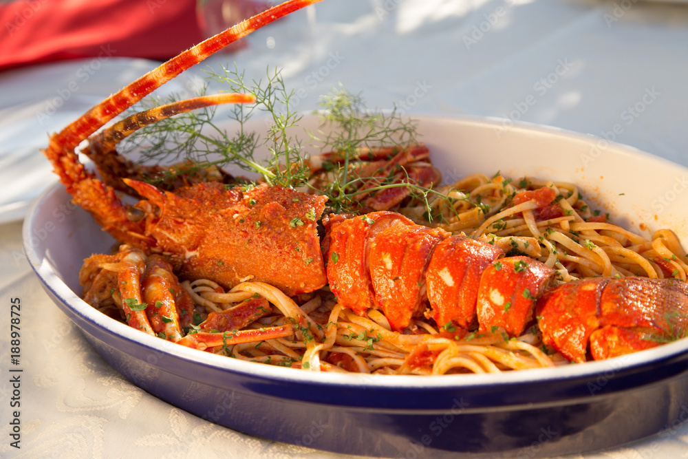 Lobster with pasta cooked in mediterranean style, restaurant Croatia.