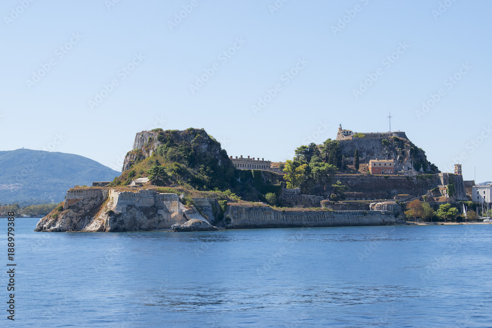 Panoramic view of Corfu island from water. Castle and old town