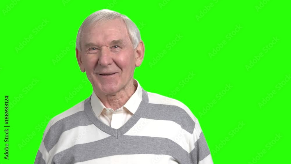 Cheerful grandpa having conversation with you. Laughing grandfather talking to you and arguing, front view. Green hromakey background. Cheerful grandpa having conversation with you. Laughing grandfather talking to you and arguing, front view. Green hromakey background.
